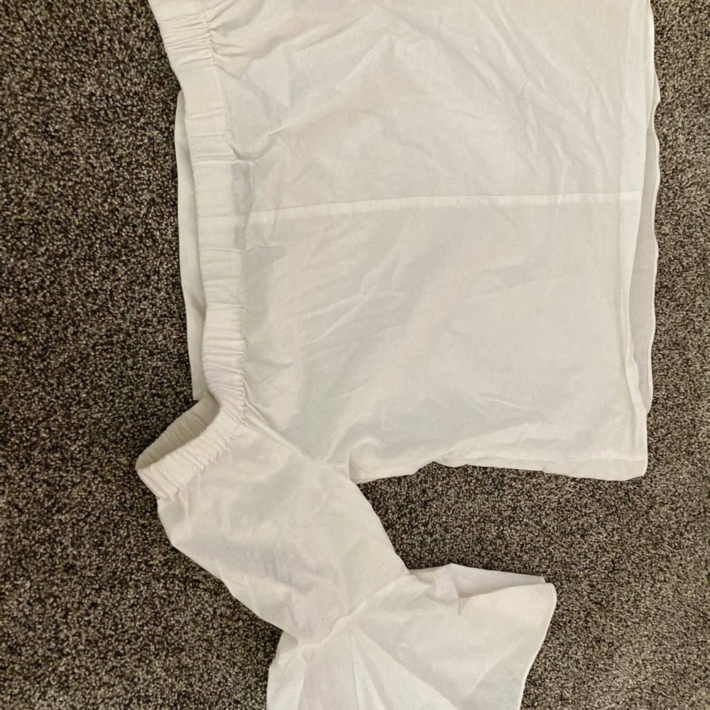 Jennifer Lopez off the shoulders top size medium